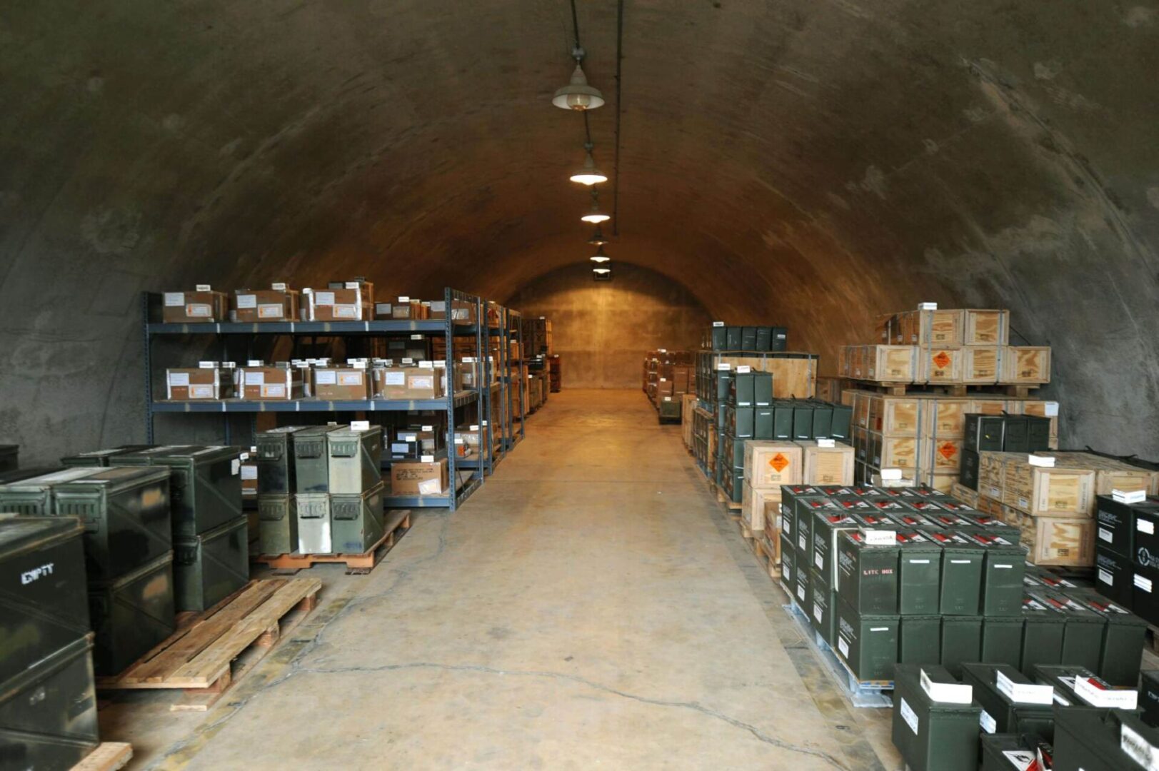 A warehouse filled with lots of boxes and pallets.